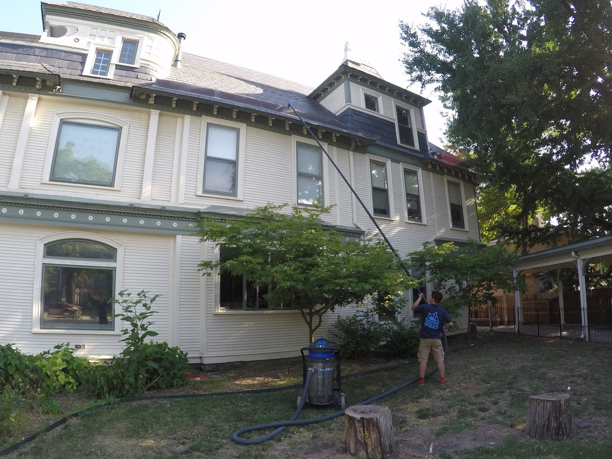 True Blue Crew safely cleans gutters from the ground.